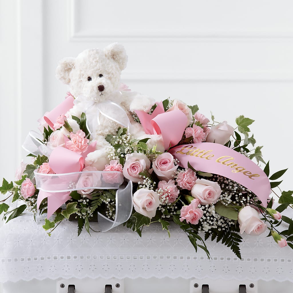 Touch of Sympathy Casket Spray – Karnation Korner Florist, Dunedin FL