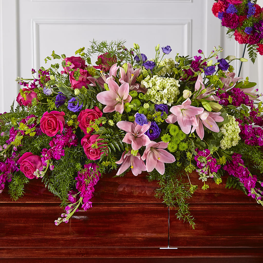 Radiant Tribute Casket Spray – Karnation Korner Florist, Dunedin FL
